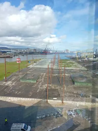 View of the Belfast Titanic Experience and slipway with the gantry context