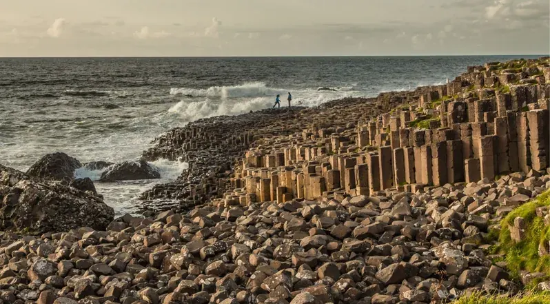 Waves breaking over the hexagonal basalt stones at the Giant's Causeway