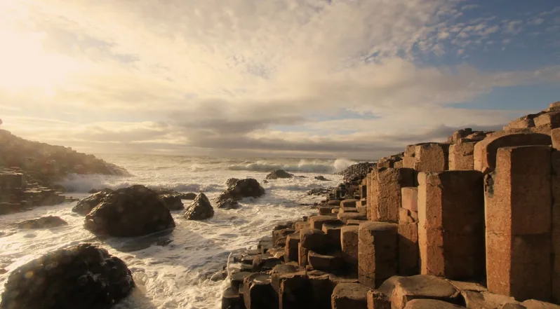 Sunset light on the basalt columns and Atlantic coastline at the Giant's Causeway