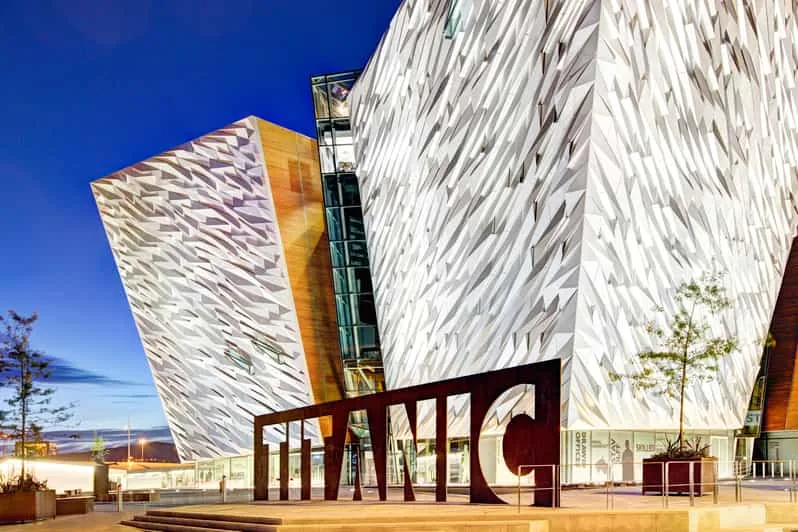 Belfast Titanic Experience museum exterior at sunset, silver shard cladding